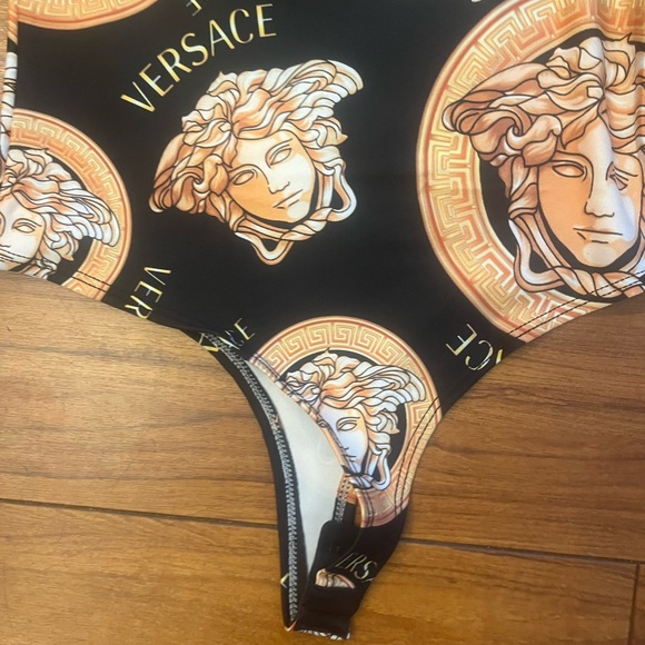 Versace Black and Gold One Piece bodysuit - Picture 2 of 5